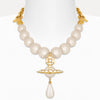 Pearl necklace with gold accents on a white background