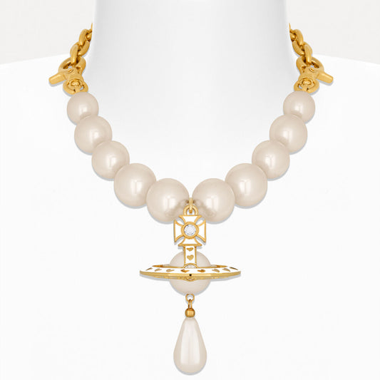 Pearl necklace with gold accents on a white background