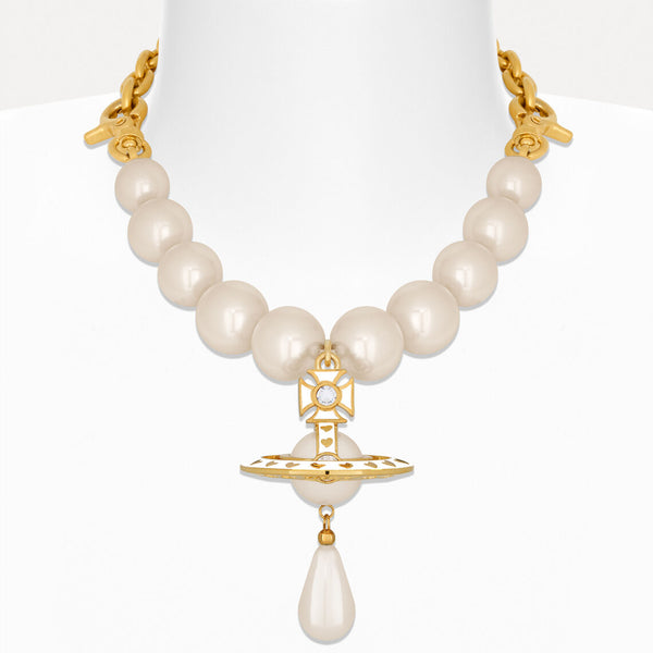 Pearl necklace with gold accents on a white background