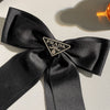 Prada Bow Tie Hair Clip