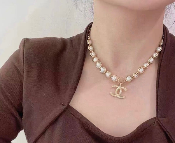 Chanel Gold Pearl Necklace